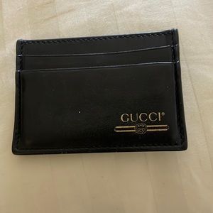 Gucci money clip wallet. Comes with box and dust bag.